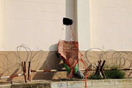 A square hole in the wall of a detention centre is seen near the Thailand-Malaysia border in Hatyai, Thailand, November 20, 2017. Picture taken November 20, 2017. Dailynews/ via REUTERS