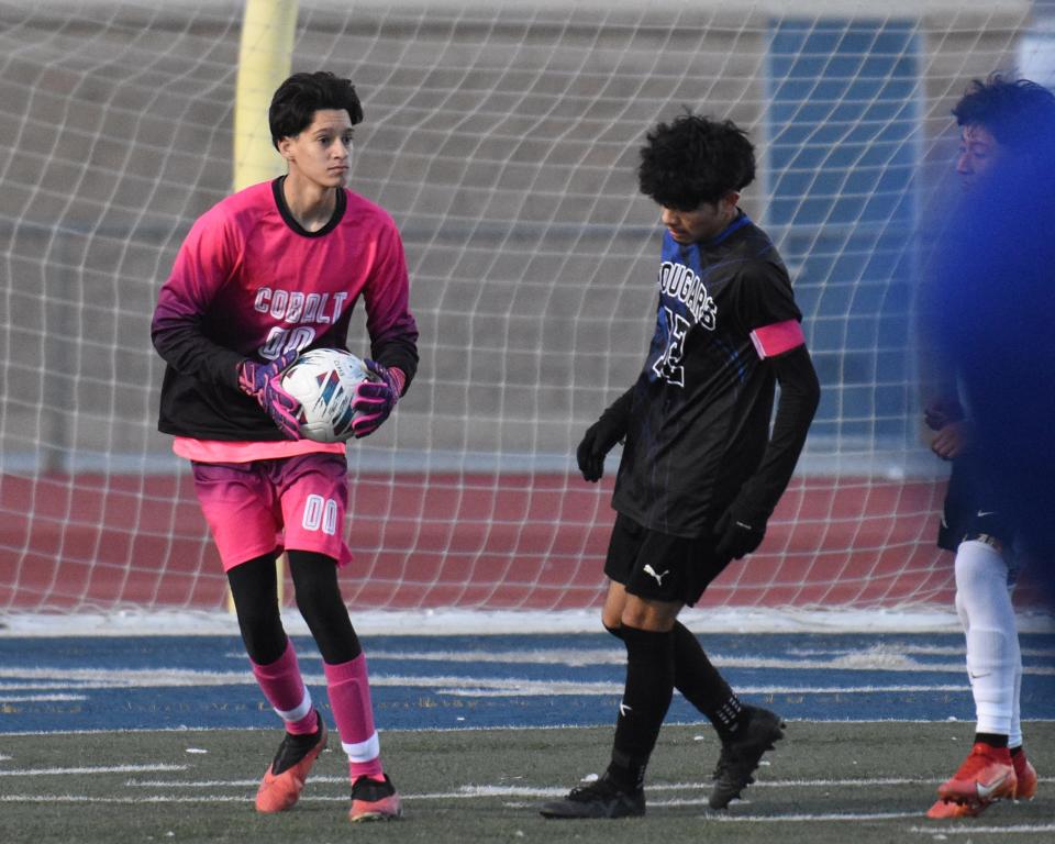 Cobalt Institute of Math & Science Academy goal keeper Christopher De La Cruz grabs the ball during the first half against Hawthorne MSA in second round of CIF-Southern Division 7 playoffs on Tuesday, Feb. 13, 2024 in Victorville. CIMS won 2-0 and advanced to the to the quarterfinals.