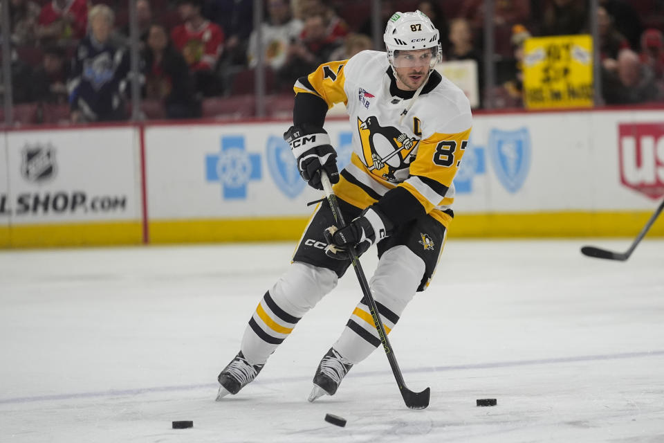 Pittsburgh Penguins center Sidney Crosby warms up for the team's NHL hockey game against the Chicago Blackhawks, Thursday, Feb. 15, 2024, in Chicago. (AP Photo/Erin Hooley)