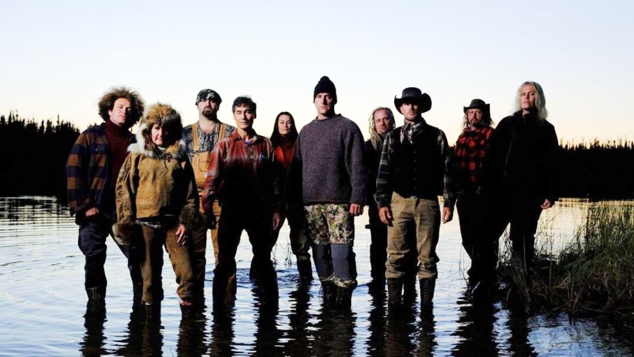  The cast of Alone season 10 stand in shallow water 