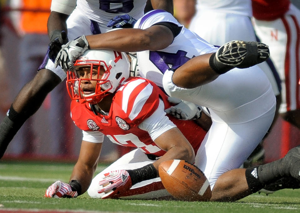 LINCOLN, NE - NOVEMBER 5: Cornerback Ciante Evans #17 of the Nebraska Cornhuskers scrambles after a fumble during their game against the Northwestern Wildcats at Memorial Stadium November 5, 2011 in Lincoln, Nebraska. (Photo by Eric Francis/Getty Images)