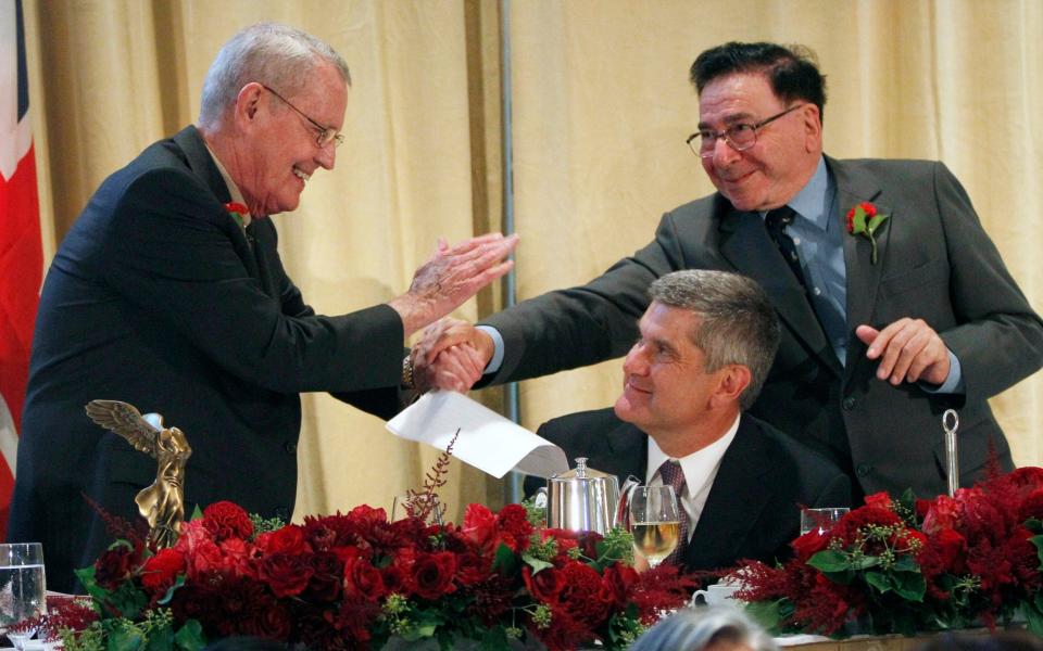 Calne and Thomas Starzl, of the University of Pittsburgh, congratulate each other after sharing the 2012 Lasker DeBakey Clinical Medical Research Award for developing liver transplantation