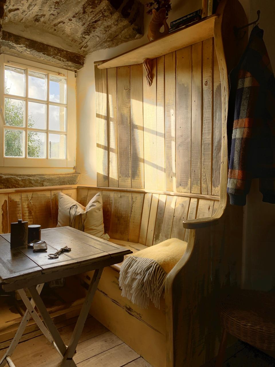 A seating area in the castle made from unused floor boards from the castle's restoration.