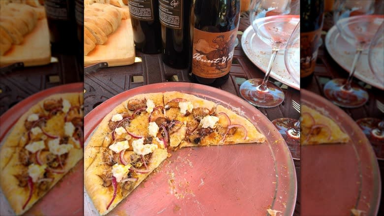 Pizza and wine on a table