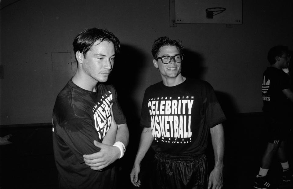 Rob Lowe and Reeves play in a celebrity basketball game.