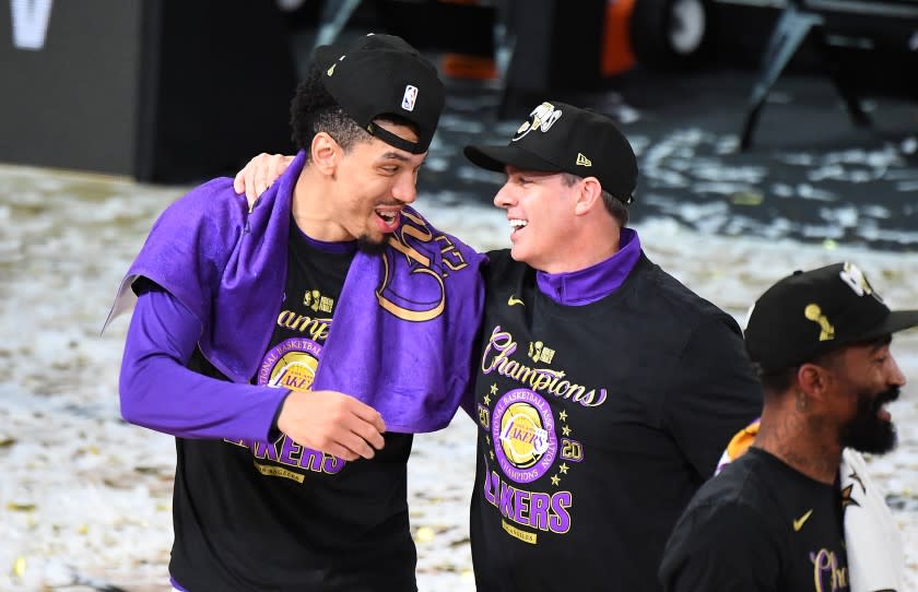 ORLANDO, FLORIDA OCTOBER 11, 2020-Lakers player Danny Green and head coach Frank Vogel celebrate the NBA Championship in Game 6 of the NBA FInals in Orlando Sunday. (Wally Skalij/Los Angeles Times)