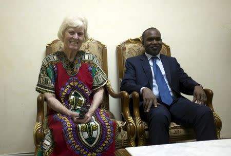 Freed hostage Jocelyn Elliott (L), who was kidnapped with her husband in Burkina Faso by a group affiliated to al Qaeda, sits with Burkina Faso's Foreign Minister Alpha Barry after being freed and upon arrival in Ouagadougou, Burkina Faso, February 8, 2016. REUTERS/Nabila El Hadad