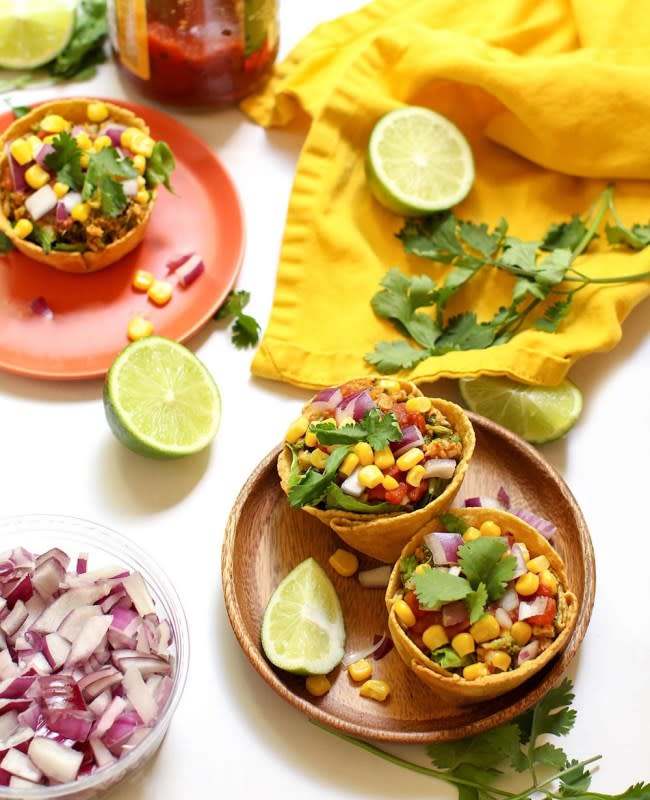 <p>feastingonfruit.com</p><p>With crunchy homemade corn cups, romaine lettuce, cauliflower-based "meat"<a href="http://nataliejo.co/home/2015/03/06/secretly-cruciferous-crunchy-tacos-2" rel="nofollow noopener" target="_blank" data-ylk="slk:,;elm:context_link;itc:0;sec:content-canvas" class="link ">,</a> a boatload of toppings, and a sprig of cilantro, these little taco cups are an abundance of flavorful veggies all in a one hand-held package.</p><p><strong>Get the recipe: <a href="http://www.feastingonfruit.com/taco-salad-cups/" rel="nofollow noopener" target="_blank" data-ylk="slk:Vegan Taco Salad Cups;elm:context_link;itc:0;sec:content-canvas" class="link ">Vegan Taco Salad Cups</a></strong></p>