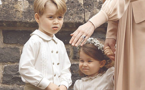 Prince George of Cambridge and Princess Charlotte of Cambridge attend the wedding of Pippa Middleton and James Matthews  - Credit: Max Mumby/Getty
