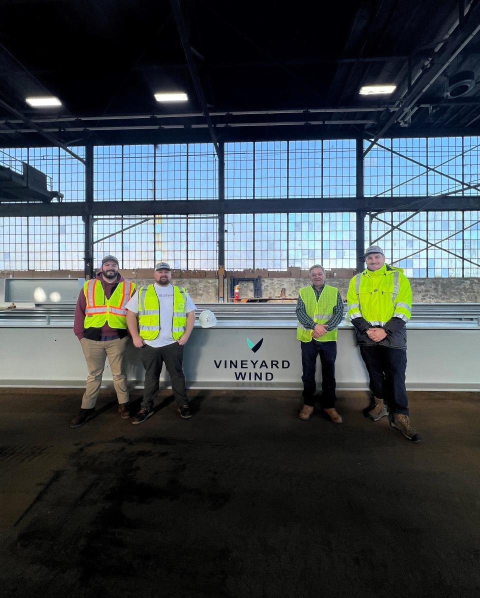 Dan Kent of Vineyard Wind, Mike Quinn, Charlie Quinn and Lasse Paulsen from Vinyard Wind meet at the ongoing renovation of Pope's Island.