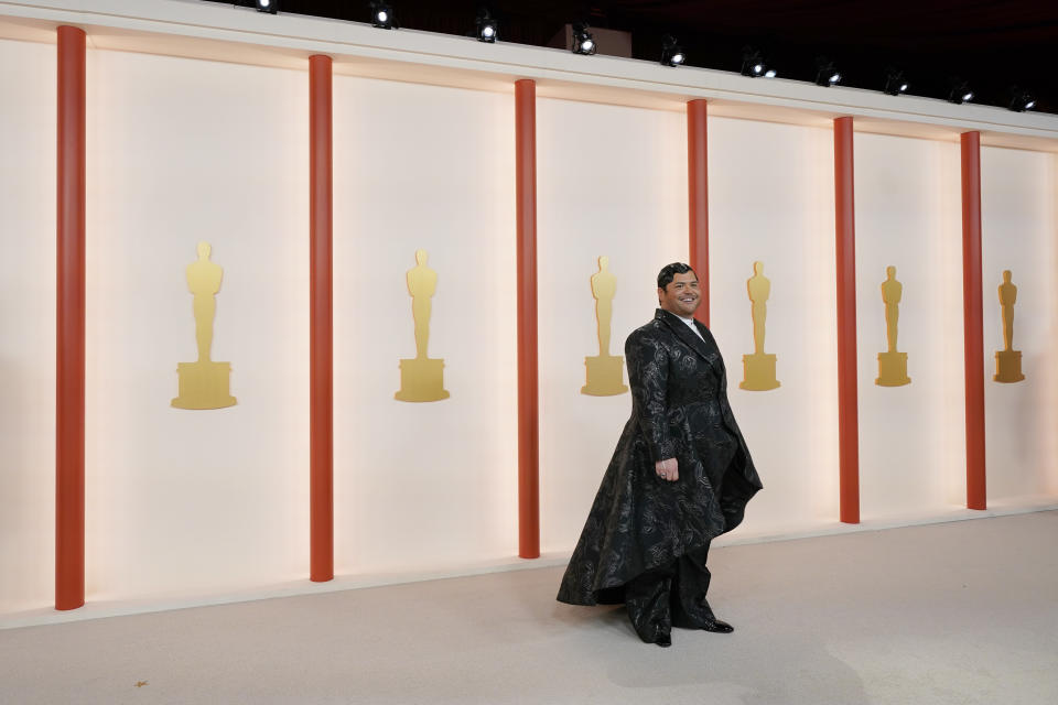 Harvey Guillen arrives at the Oscars on Sunday, March 12, 2023, at the Dolby Theatre in Los Angeles. (AP Photo/Ashley Landis)