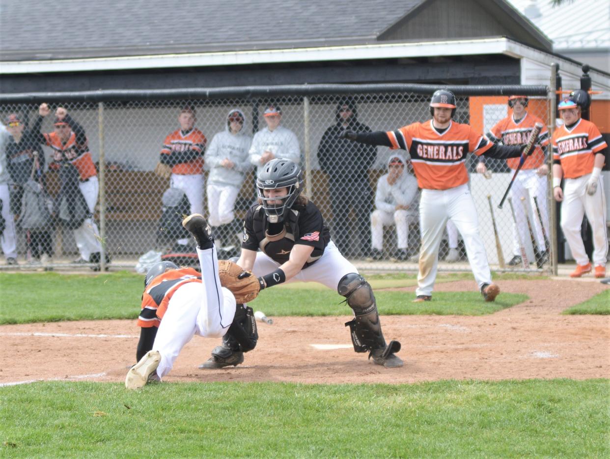 River View catcher Mark Dickerson tags out Ridgewood's Trent Warden at the plate in the bottom of the fifth inning of Saturday's game. The Black Bears won 4-2.