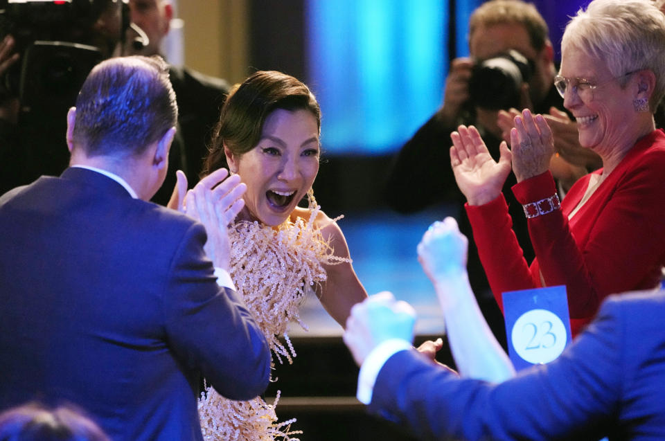 Michelle Yeoh reacts to winning the award for outstanding performance by a female actor in a leading role for "Everything Everywhere All at Once" at the 29th annual Screen Actors Guild Awards on Sunday, Feb. 26, 2023, at the Fairmont Century Plaza in Los Angeles. (AP Photo/Chris Pizzello)