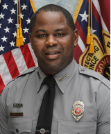 Firefighter Deandre M. Hartman was injured in a house fire on May 14, 2023, that killed a man and his grandson. He remains at UAB Hospital's Burn and Trauma ICU with burns covering 20% of his body.