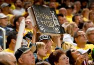 <p>A young Penguins fan hold up a sign against the Columbus Blue Jackets in Game Two of the Eastern Conference First Round during the 2017 NHL Stanley Cup Playoffs at PPG Paints Arena on April 14, 2017 in Pittsburgh, Pennsylvania. (Photo by Joe Sargent/NHLI via Getty Images) </p>