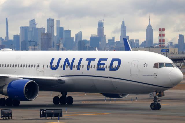 <p>Gary Hershorn/Getty</p> United Airlines flight