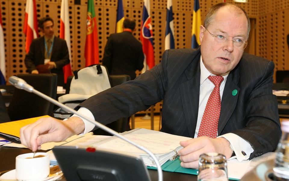 Peer Steinbruck...Germany's Finance Minister Peer Steinbruck prepares a coffee at the start of an informal meeting of ministers for economic and financial affairs at the Congres center in Brdo, Slovenia, Friday, April 4, 2008. Euro zone officials warned Friday that governments had to act to curb a possible inflation spiral as record-high price increases the risk of hurting people on low incomes. (AP Photo/Geert Vanden Wijngaert) - GEERT VANDEN WIJNGAERT/AP