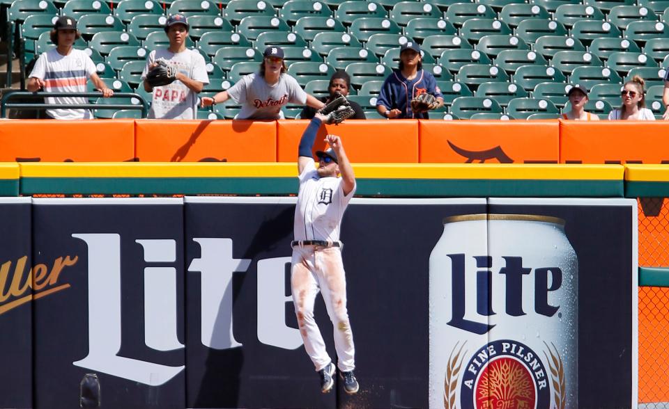 Tigers left fielder Austin Meadows catches a fly ball against the fence hit by White Sox catcher Seby Zavala during the eighth inning of the Tigers' 13-0 loss to the White Sox on Wednesday, June 15, 2022, at Comerica Park.