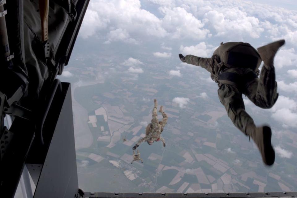 U.S. Army Special Forces members assigned to 10th Special Forces Group (Airborne) perform an airborne operation out of a U.S. Air Force MC-130J Commando II assigned to the 352d Special Operations Wing, near Mont Saint Michel, France, May 18, 2019.