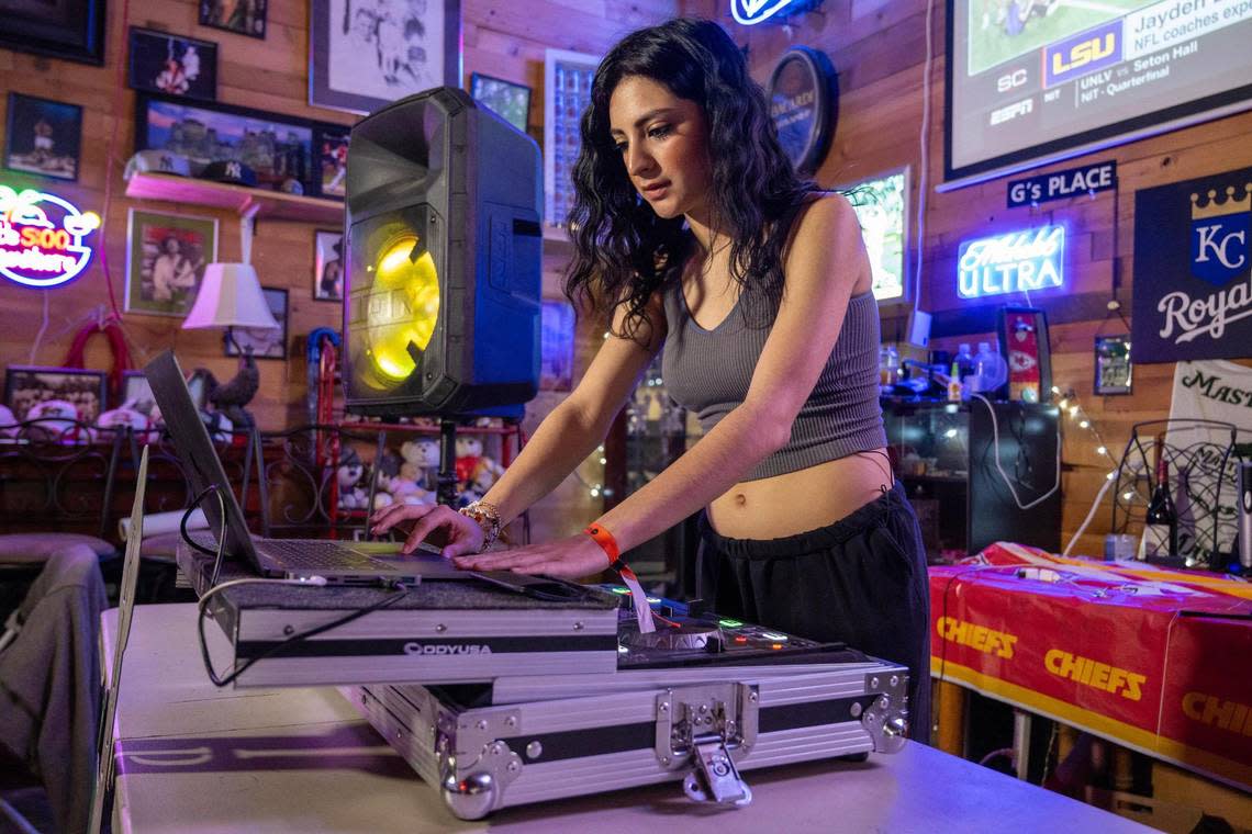 “I kind of just wanted to honor her and keep her legacy going,” said Adriana Galvan, 19, with her mother’s laptop and DJ mixing board inside the family’s party room. Her mother, Lisa Lopez-Galvan, was killed by gunfire at the Chiefs Super Bowl rally. On Saturday, Adriana will DJ at an event in her mother’s stead. Tammy Ljungblad/tljungblad@kcstar.com