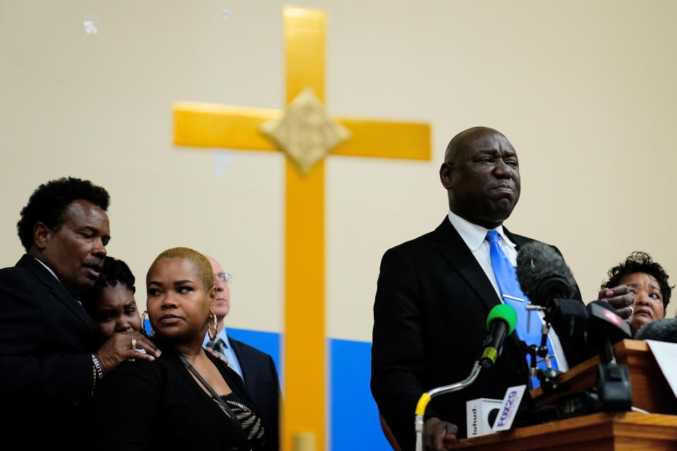 Attorney Benjamin Crump, accompanied by the family of Ruth Whitfield, a victim of shooting at a supermarket, speaks with members of the media during a news conference in Buffalo, N.Y., Monday, May 16, 2022. (AP Photo/Matt Rourke)