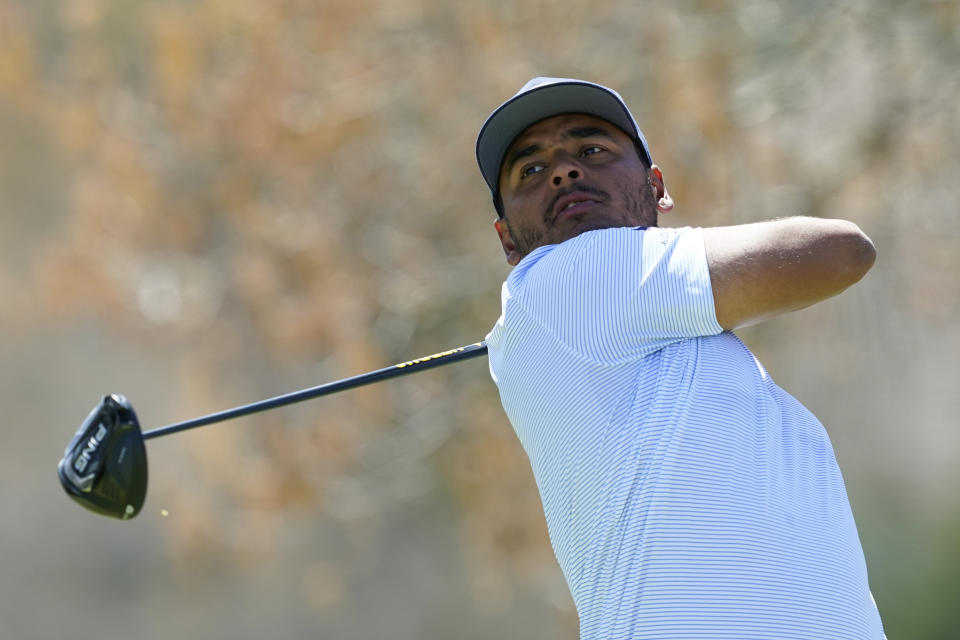 FILE - Sebastian Munoz watches his shot from the sixth tee during the third round of the Dell Technologies Match Play Championship golf tournament, Friday, March 25, 2022, in Austin, Texas. Munoz will compete on the International team at the Presidents Cup beginning Thursday, Sept. 22. (AP Photo/Tony Gutierrez, File)