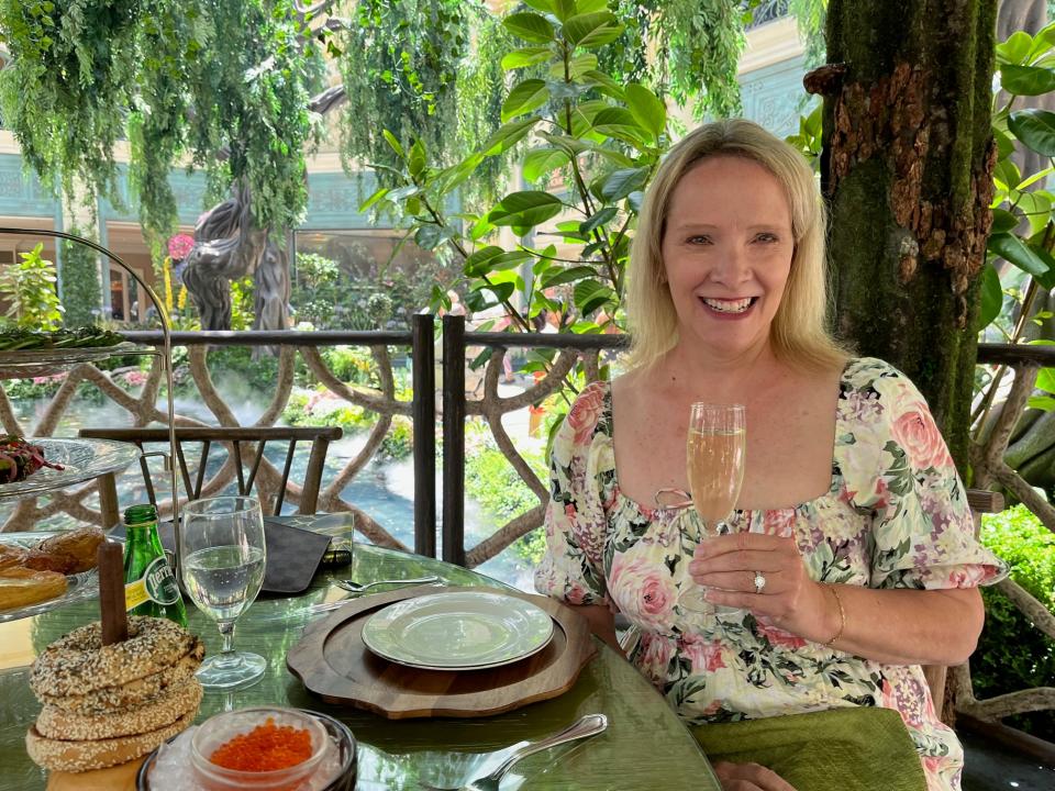 wendy lee sitting at the garden table