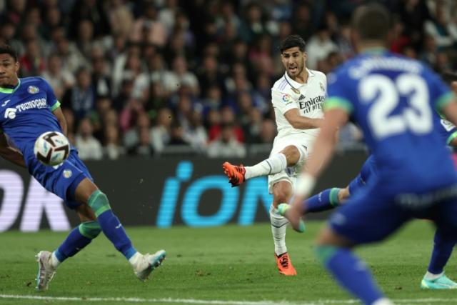 Marco Asensio scores Real Madrid's opener against Getafe in the La Liga clash on Saturday