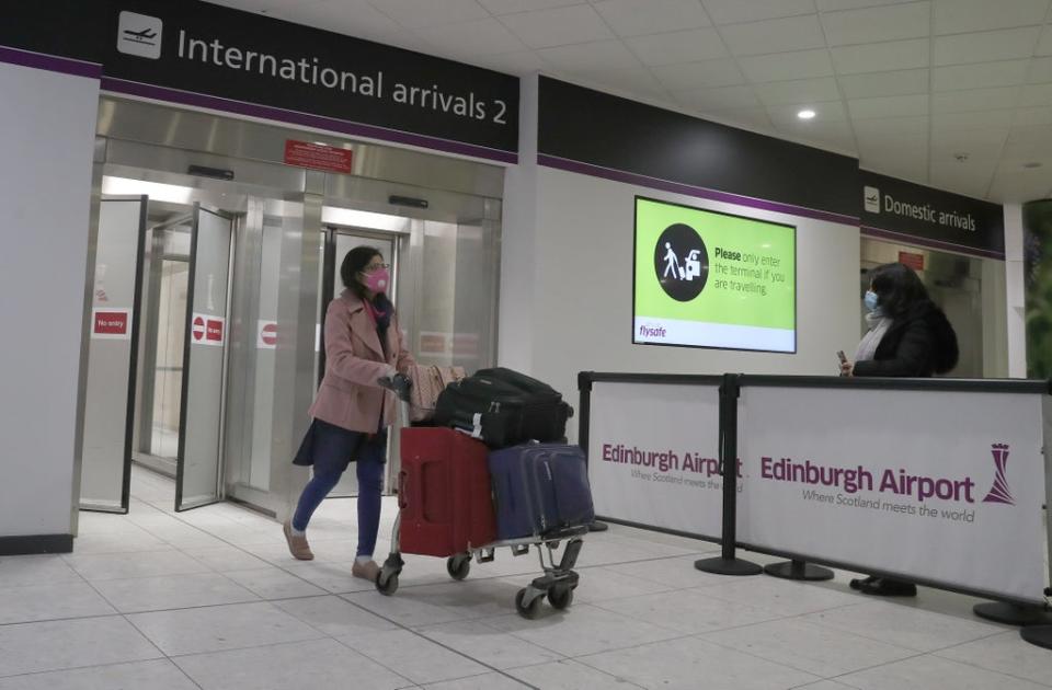 Travellers into Scotland will not have to self-isolate unless their lateral flow test is positive (Andrew Milligan/PA) (PA Archive)