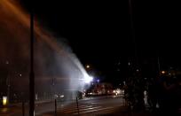 Police use a water cannon during an anti-government demonstration in Hong Kong