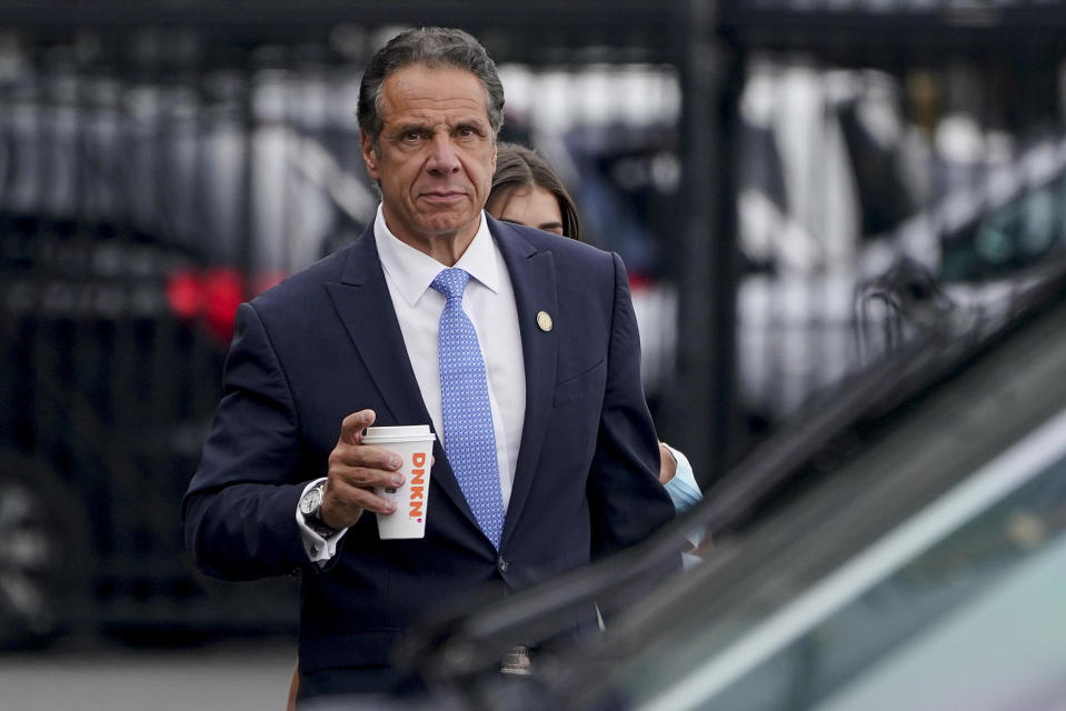 New York Gov. Andrew Cuomo prepares to board a helicopter after announcing his resignation, Aug. 10, 2021, in New York. / Credit: Seth Wenig / AP