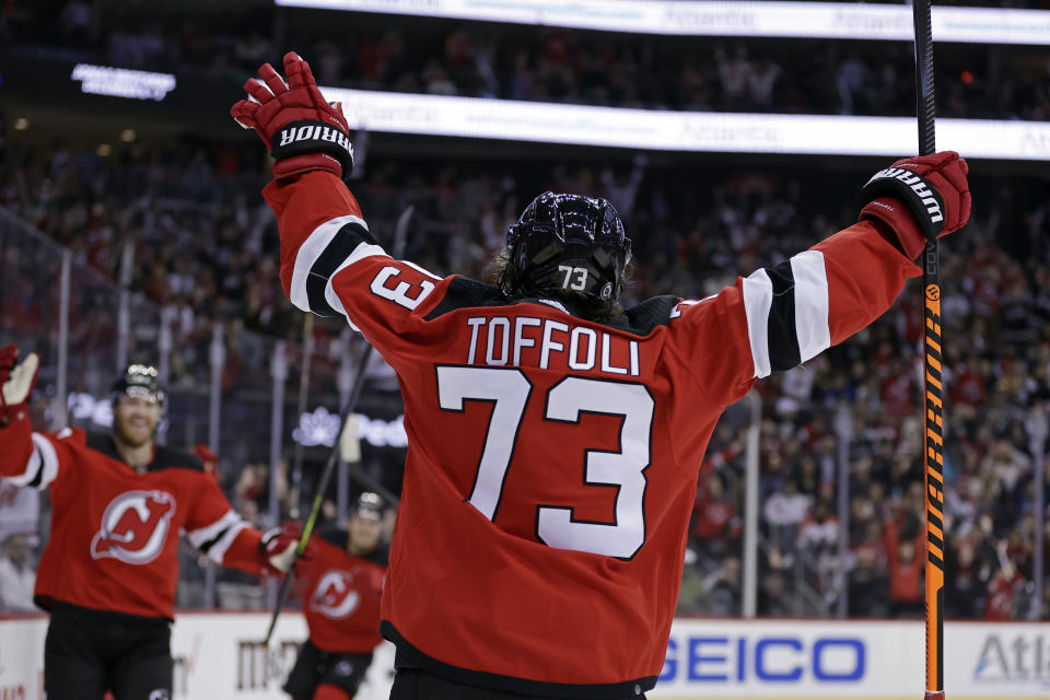 New Jersey Devils right wing Tyler Toffoli celebrates his second goal of the second period against the Washington Capitals in an NHL hockey game Wednesday, Oct. 25, 2023, in Newark, N.J. (AP Photo/Adam Hunger)