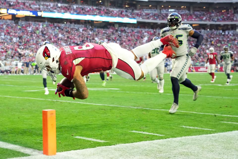 Arizona Cardinals running back James Conner dives for a touchdown against the Seattle Seahawks.