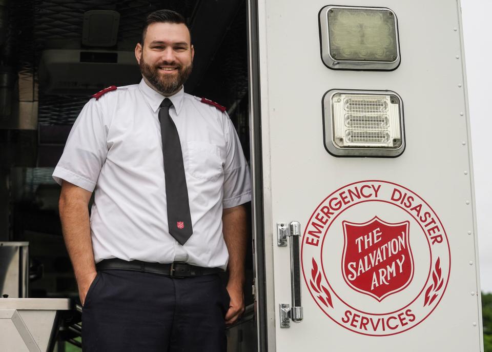 Salvation Army of the Treasure Coast Captain Nathan Jones stands inside the mobile canteen kitchen ahead of deploying to the west coast of Florida to aid the areas that will be impacted by Hurricane Ian on Tuesday, Sept. 27, 2022, in Stuart. "Today we're heading out to Lakeland to bunker down there," said Jones. "As soon as the storm hits, we're going to follow it up, helping out on our way up to see where the majority of the damage is. We can feed up to 2,500 people per meal."