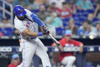 New York Mets' Starling Marte hits a single during the fifth inning of a baseball game against the Miami Marlins, Saturday, June 25, 2022, in Miami. (AP Photo/Lynne Sladky)