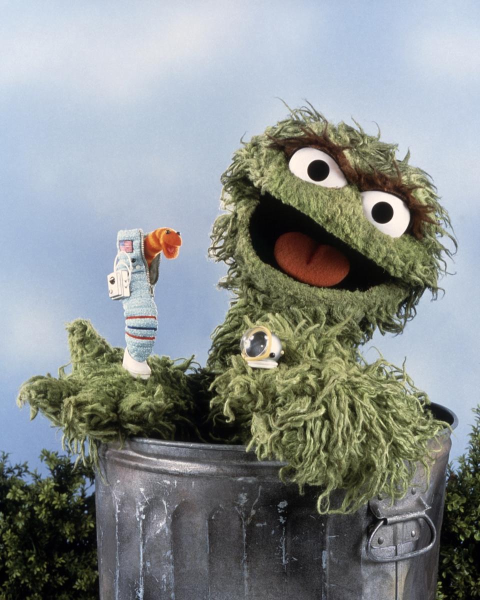Oscar in his trash can