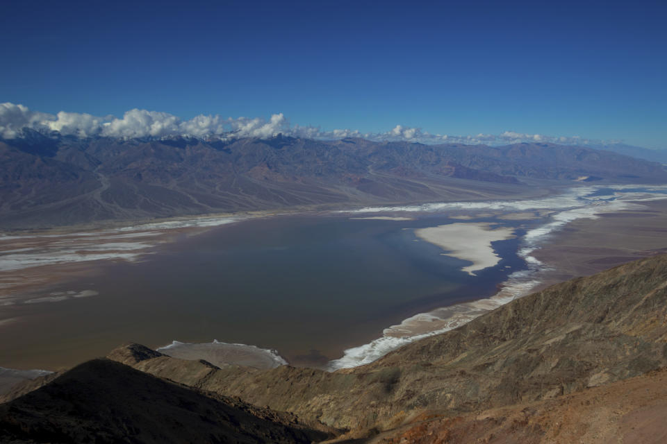 A view of the temporary lake in Death Valley on Thursday, Feb. 23, 2024, in Death Valley National Park, Calif. A series of storms have brought more than double the parks annual rainfall in the past six months. (AP Photo/Ty ONeil)