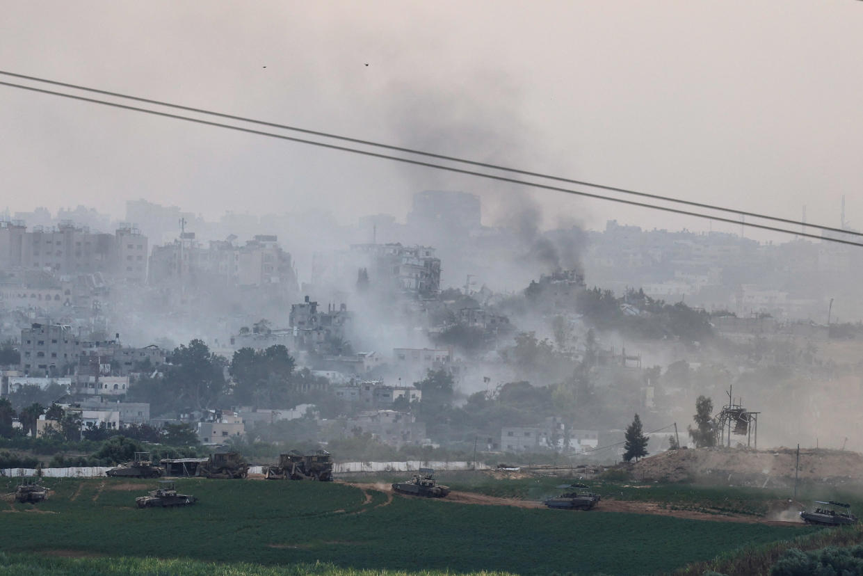 Israeli tanks and other military machines manoeuvre inside the Gaza Strip, as seen from Israel, October 29, 2023 REUTERS/Evelyn Hockstein