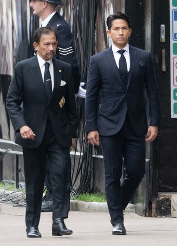 <p>Samir Hussein/WireImage</p> Sultan of Brunei Hassanal Bolkiah (left) and Prince Abdul Mateen photographed in Scotland on Sept. 8, 2022