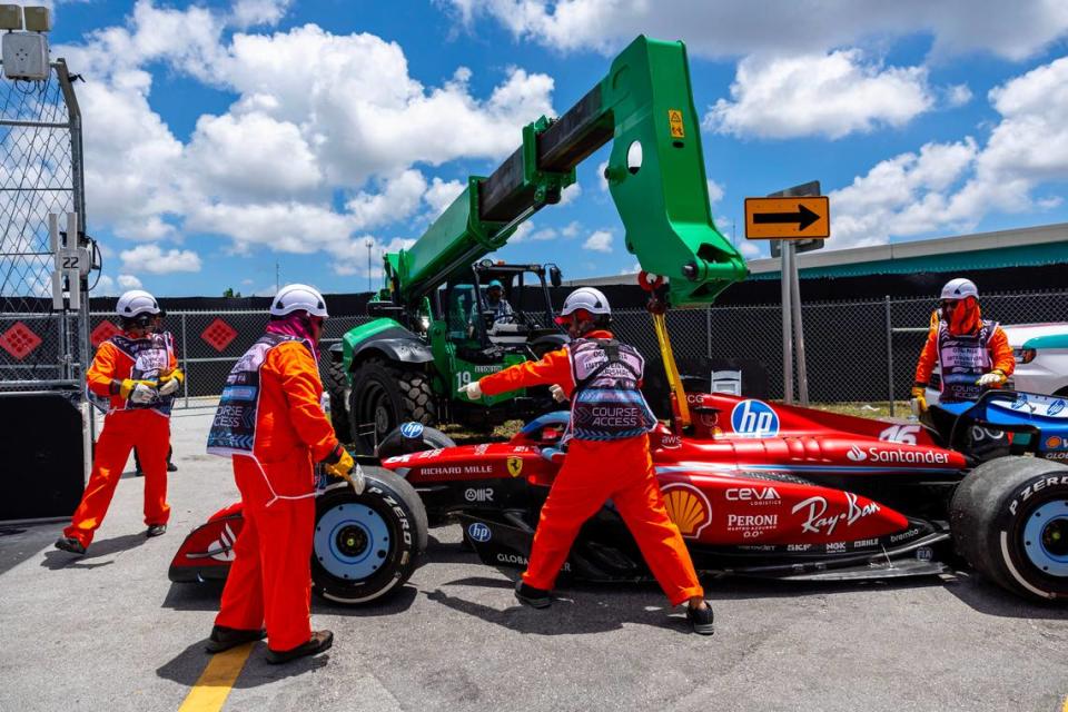 Intervention marshals move Scuderia Ferrari driver Charles Leclerc’s car after he stalled out on turn16 during a practice session on the first day of Formula One Miami Grand Prix at the Miami International Autodrome on Friday, May 3, 2024, in Miami Gardens, Fla.