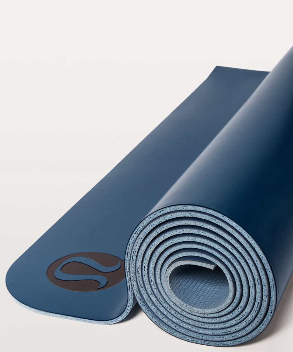 The Reversible Mat 5mm in Deep Marine/Utility Blue.  Image via Lululemon.