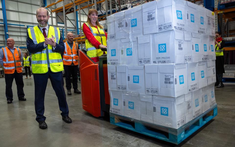 Angela Rayner and Jonathan Reynolds visit a Co-Op logisitics depot in Durham today. They were both given instruction on how to operate some of the machinery