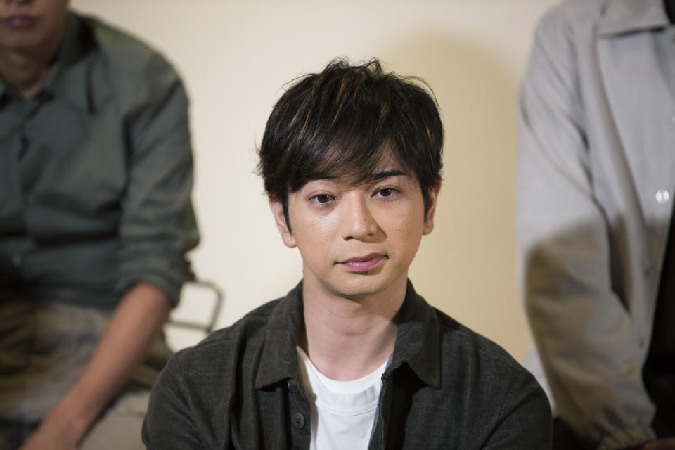 Jun Matsumoto, a member of Japanese pop music band ARASHI, listens to a question during an interview with The Associated Press in Tokyo on Thursday, Sept. 17, 2020. (AP Photo/Hiro Komae)