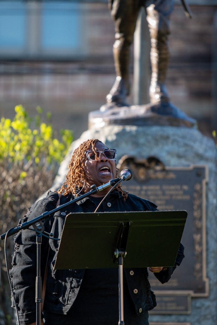 Selena Brown delivers a prayer blessing at the start of a rally for abortion rights held in Stroudsburg on May 9, 2022.