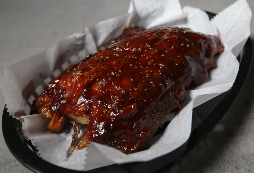 The half rack of ribs is one of the menu items at Slab Kitchen, which is open 4 to 9 p.m. Tuesday-Friday, noon to 9 p.m. Saturday and noon to 7 p.m. Sunday.