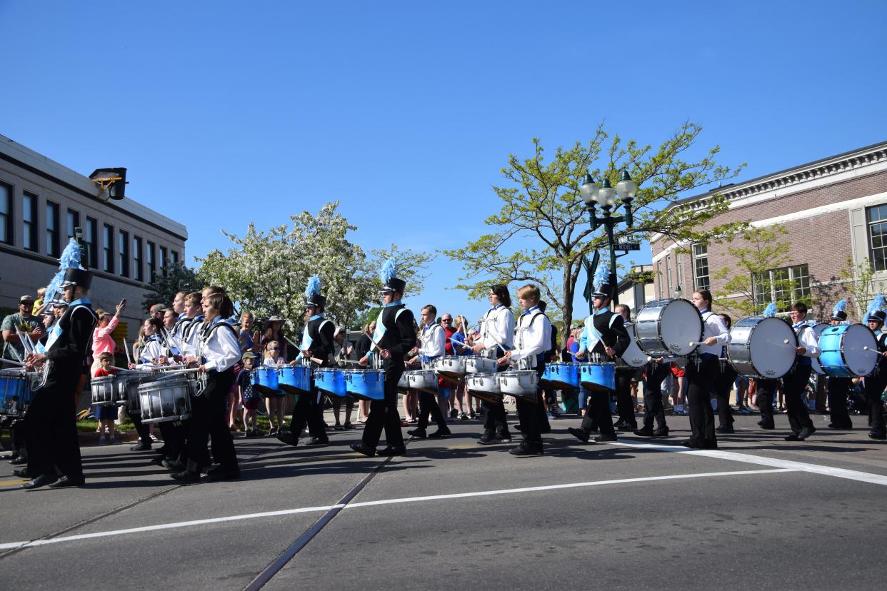 The Petoskey High School Marching Band walks along Mitchell Street for the 2023 Memorial Day parade on Monday, May 29.