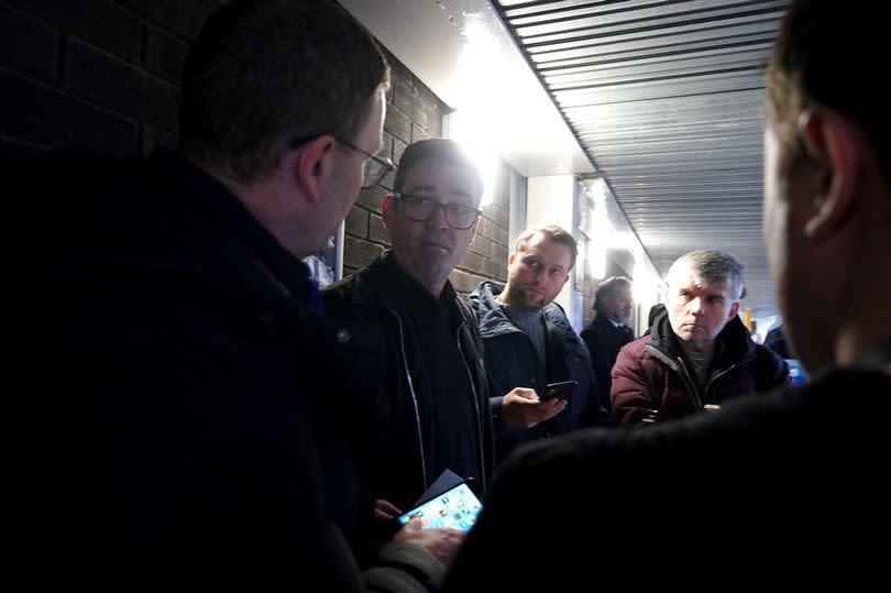 Mr Burnham - pictured speaking to reporters at Goodison Park last November - has has accused the Premier League of treating his boyhood club unfairly -Credit:PA