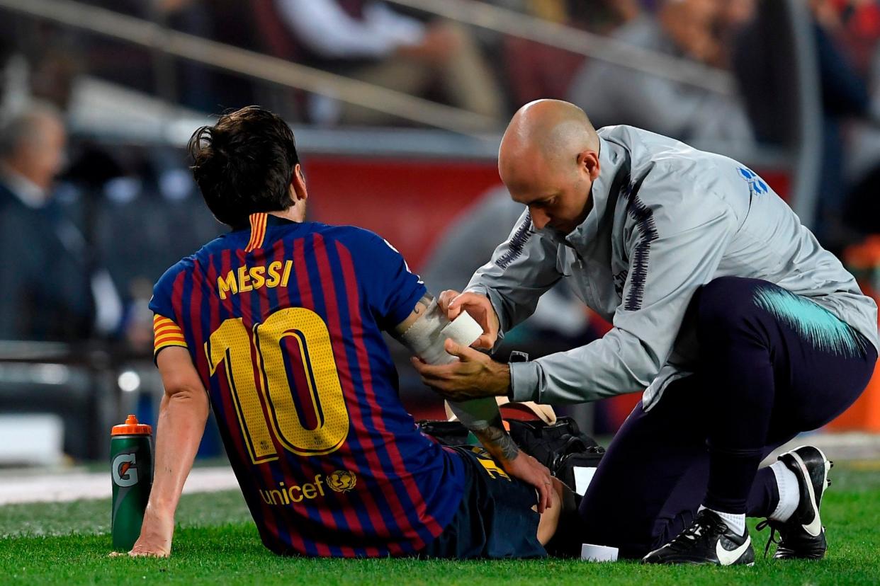 Forced off: Lionel Messi: AFP/Getty Images