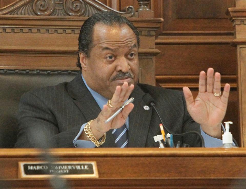 Akron City Council President Marco Sommerville reacts to being interrupted by Ernie Tarle during a public hearing on speaking opportunities in February 2012.
