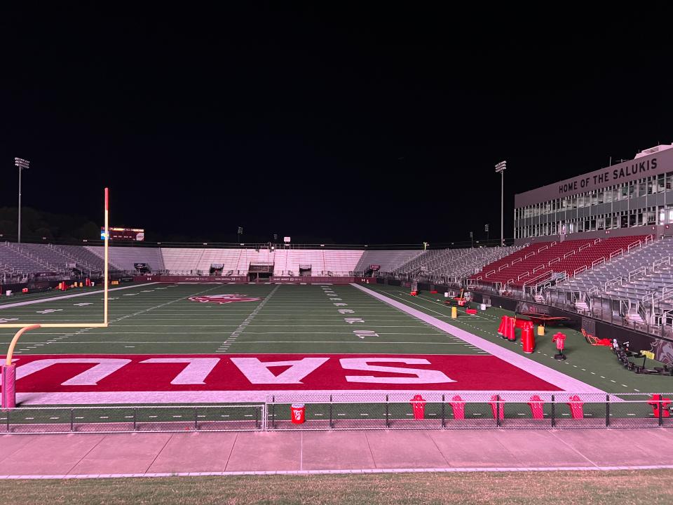 The only thing lighting the surface of the field at Saluki Stadium in Carbondale, Ill. was the glowing scoreboard.